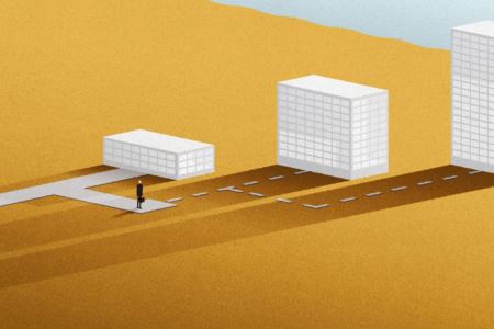 Cartoon of a man choosing a path to different sized building.