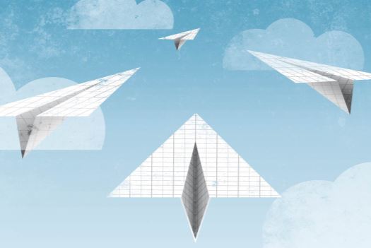 Graphic with flying paper airplanes
