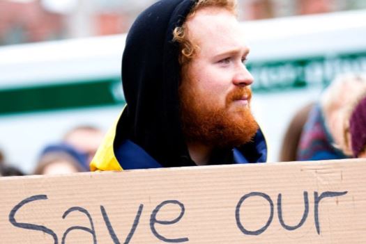 A protester holding a sign