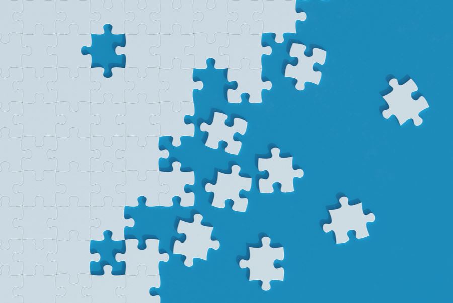 Graphic of blue puzzle pieces