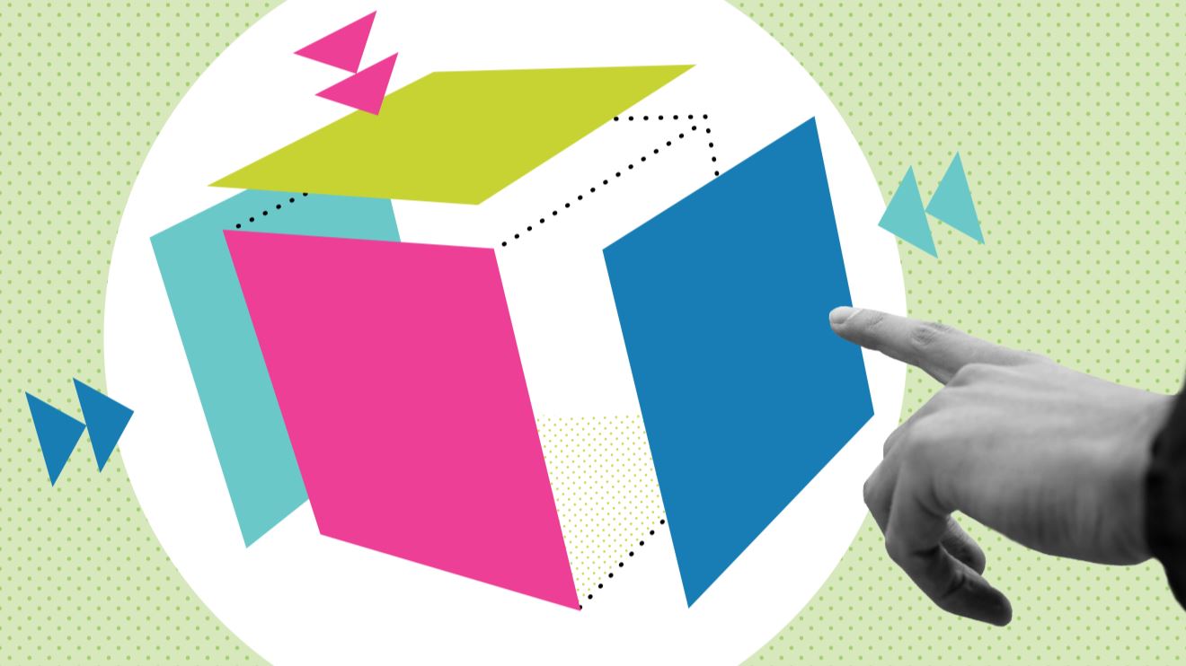 Black and white photograph of a hand pointing toward a cube made up of green, pink and blue BE-branded squares.