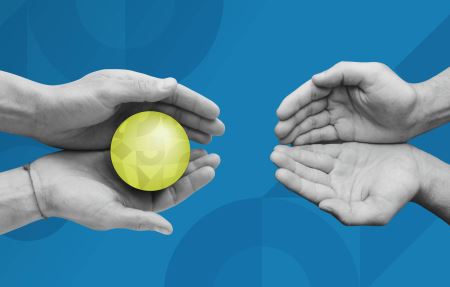 A pair of hands holding a green BrandExtract-branded sphere, passing the brand value to a new pair of hands.