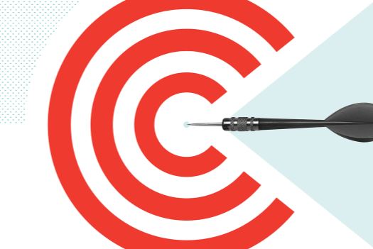 a black and white image of a dart pinned into the center of a red target on a white and light blue background