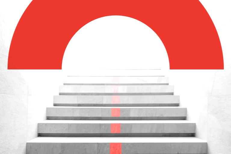 Black and white photograph of a staircase leading upwards towards a red BE arc graphic.