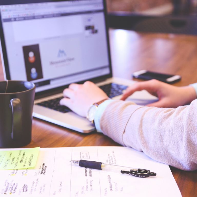 Person working on a content marketing piece for their brand
