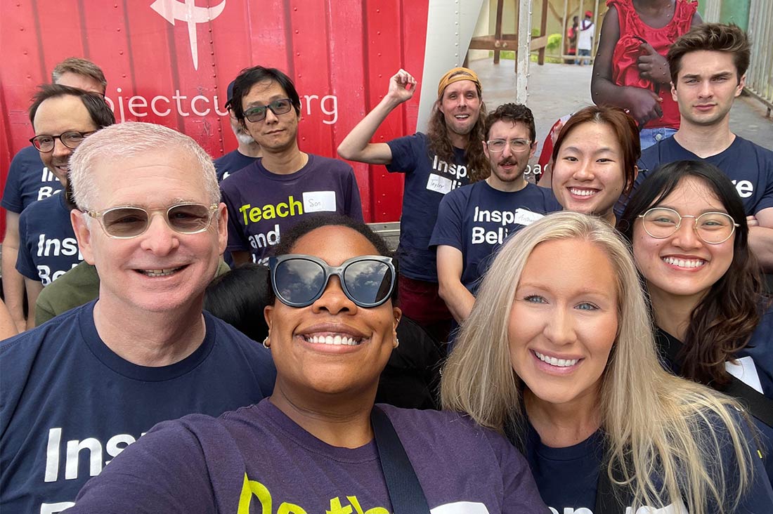 Team selfie while volunteering at Project Cure