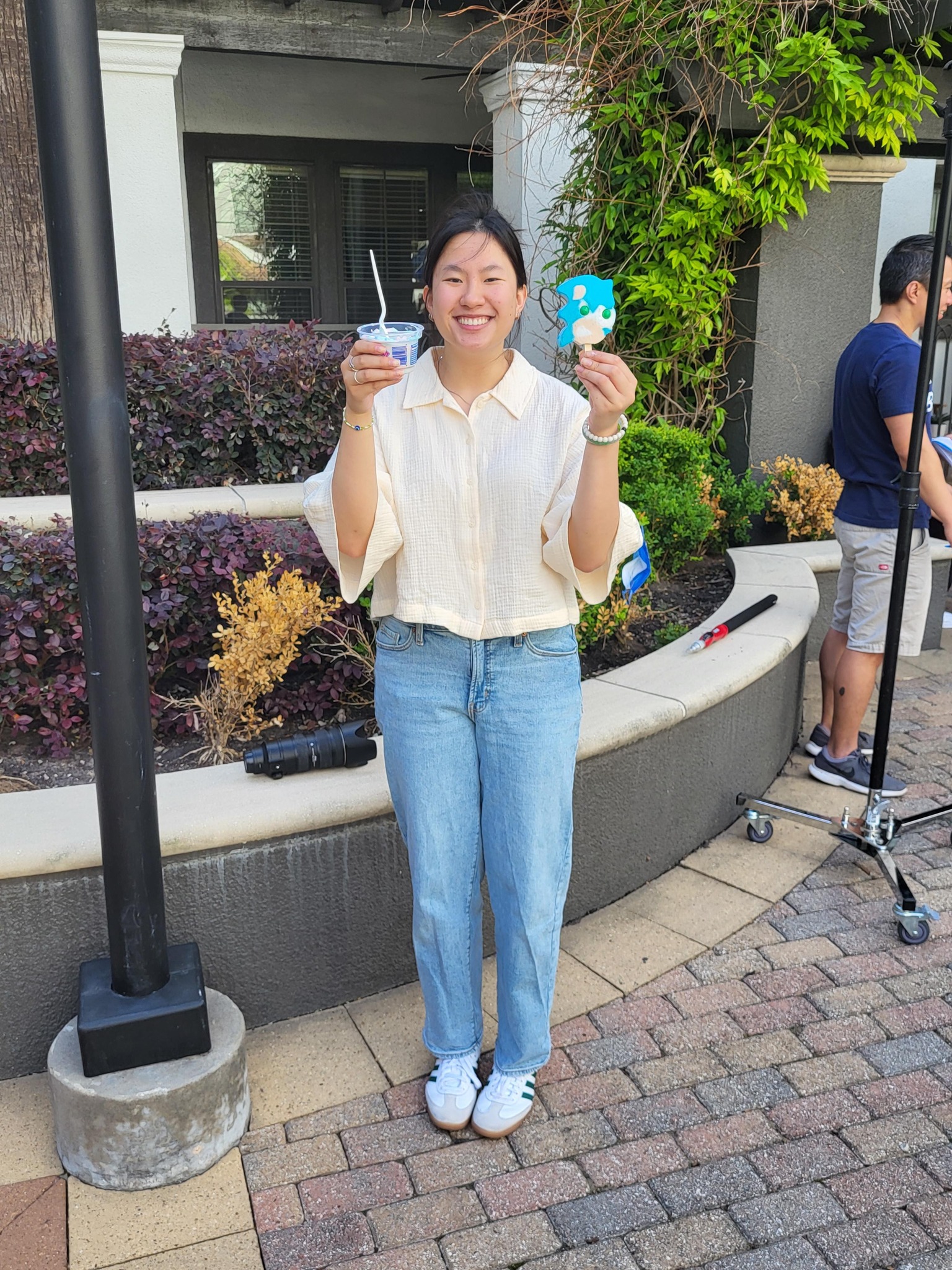 Intern laughing holding ice cream cones