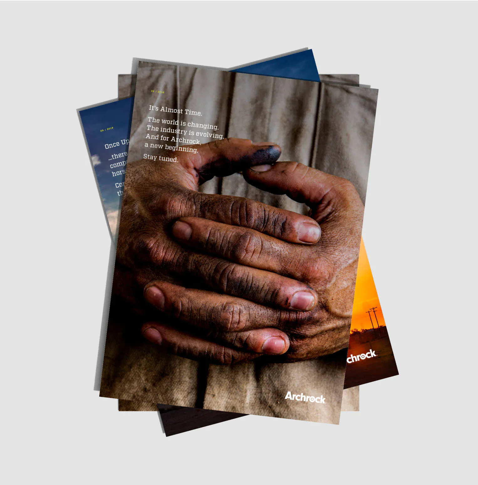 Archrock flyers plastered over each other with the top flyer featuring a close up of dirty hands clasped together