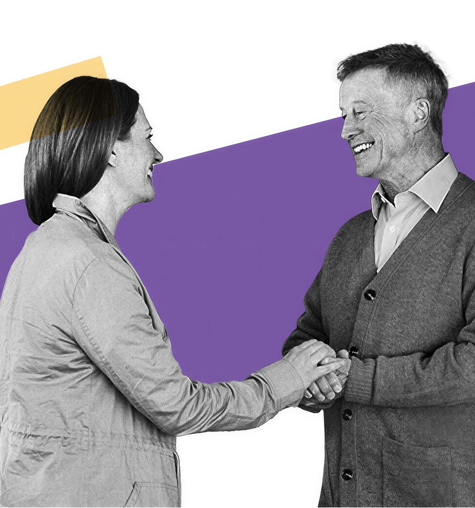 Two people facing each other and shaking hands against a bold purple and yellow geometric background.