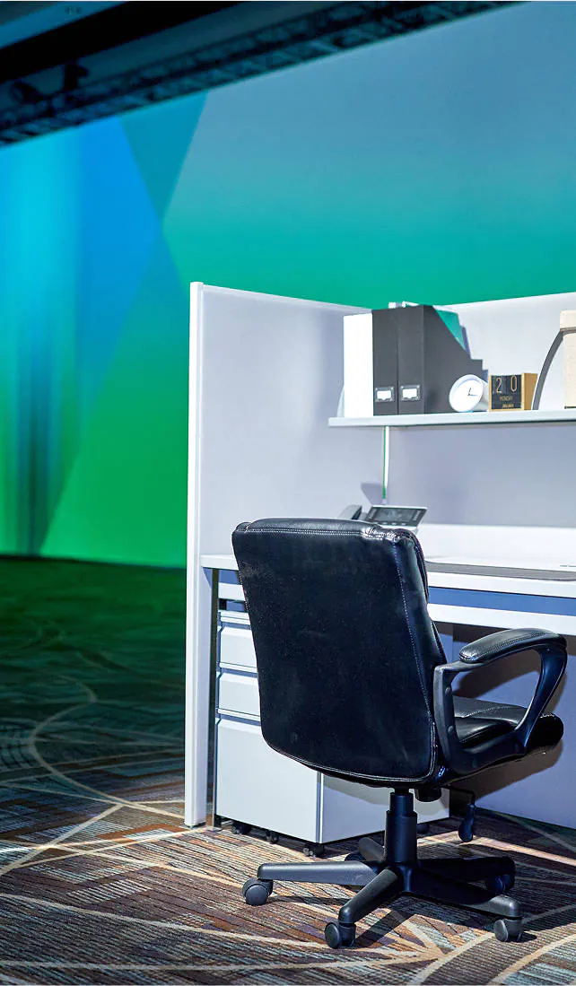 An illuminated desk display at the WillScott Experience
