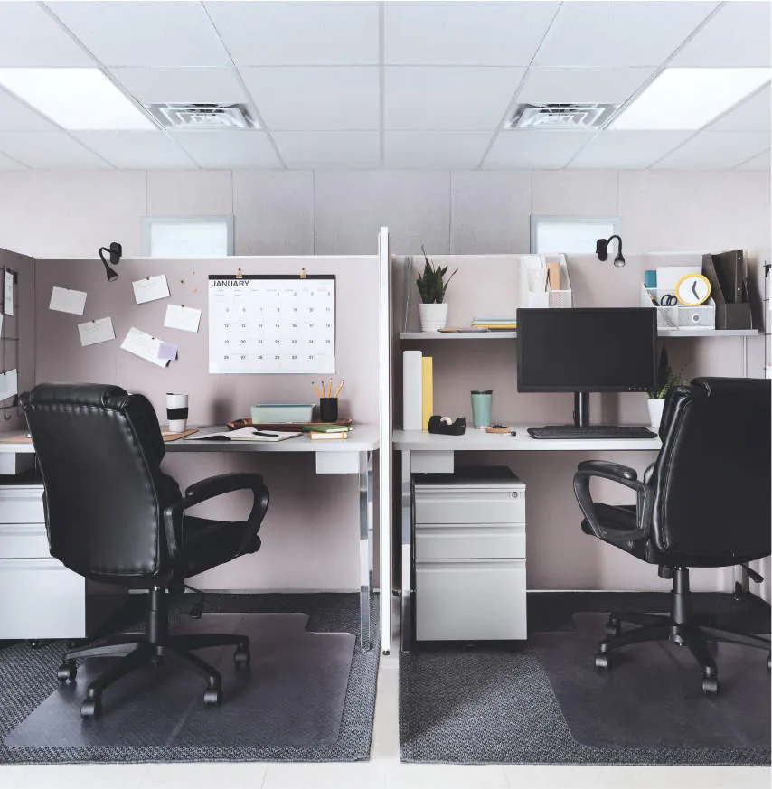 Two cubicles set up side by side in a modular space from WillScot