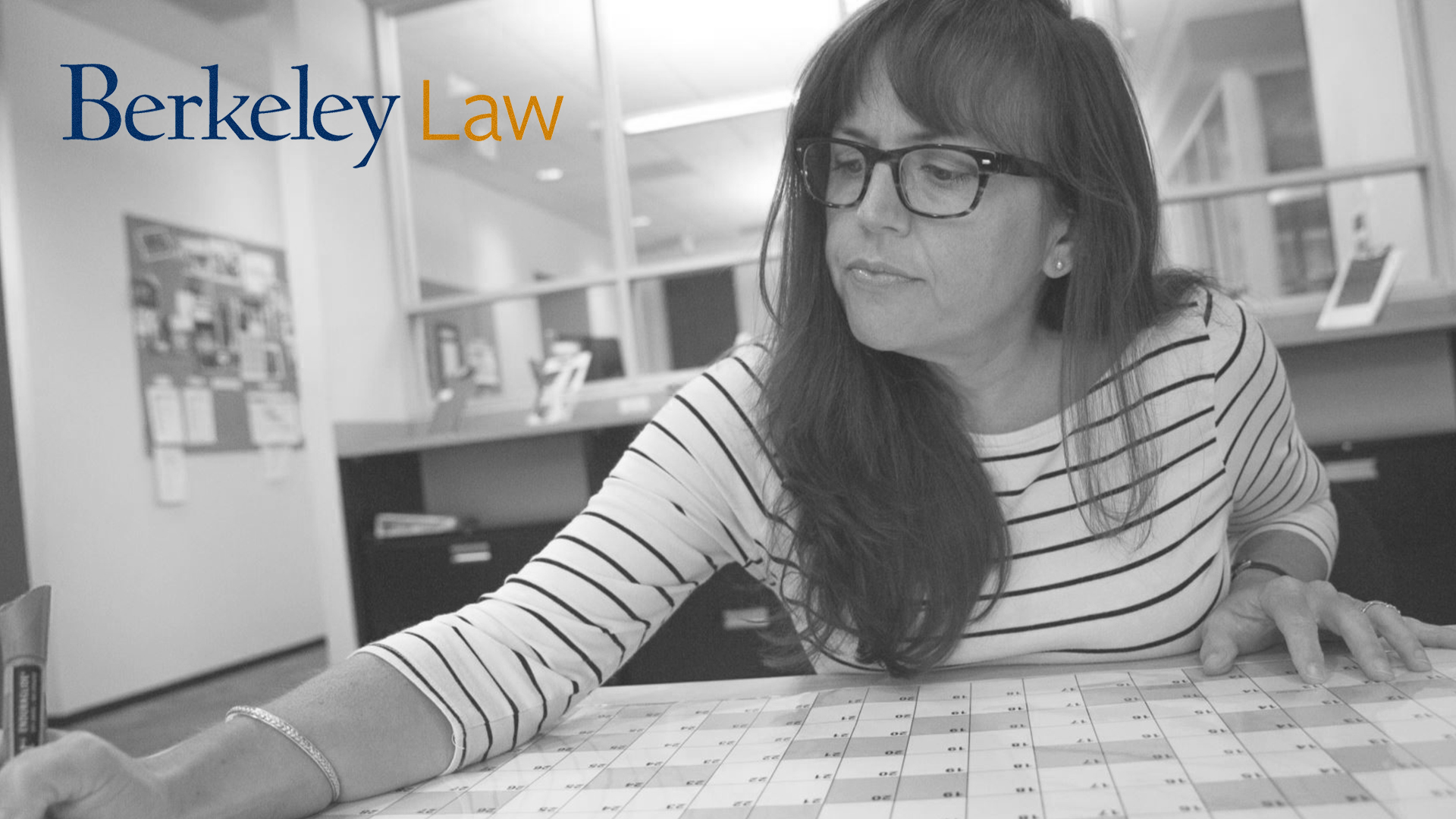 A black and white picture of Leigh Anne Bishop with the Berkeley Law logo.