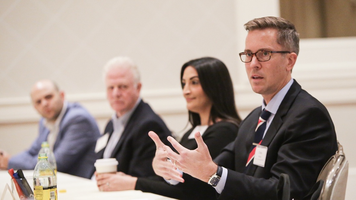 Chris Wilks  and other panelists at Presidential Forum Panel