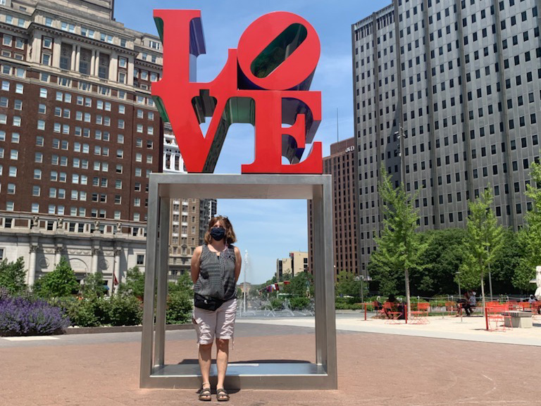 Cindy in front of red box