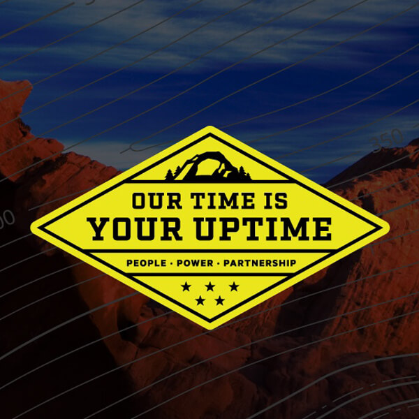 Scenery of rocks and Our Time is Your Uptime logo