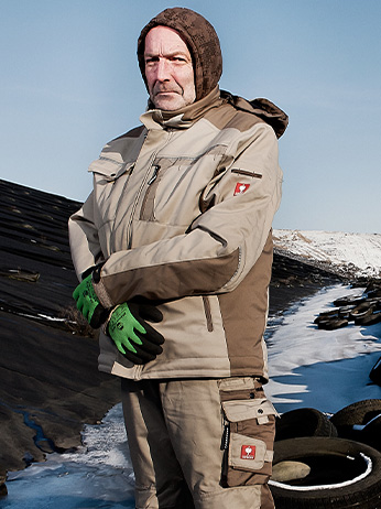 A GSE worker standing on a mountain.