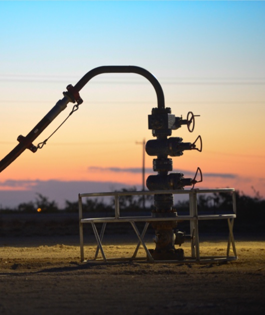 Field equipment against a skyline at a job site 